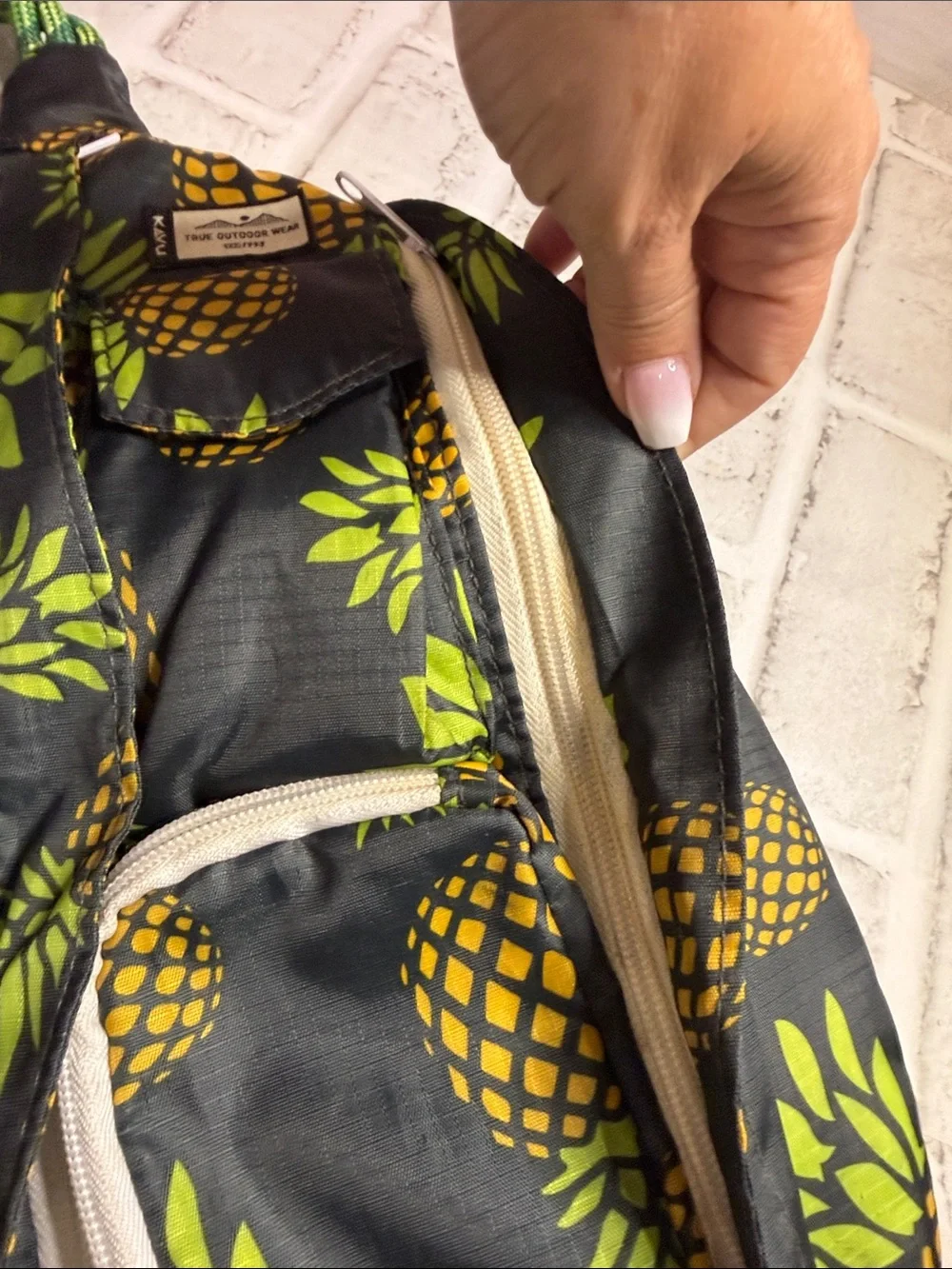 Kavu Black Sling Bag with Yellow Pineapple Print